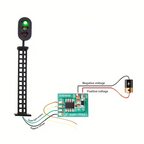 A product diagram showing a black traffic light pole with illuminated green and red lights, connected to a small green electronic circuit board labeled Y059-14VDC1, with wires labeled for green light control, negative voltage, and positive voltage. A battery is shown on the right, under the heading 'Description' on a white background.