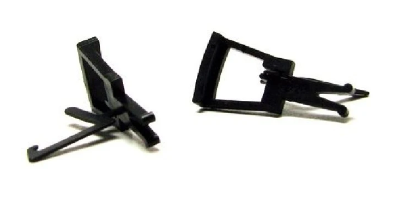 Close-up of two black Hornby R8219 style NEM couplings
